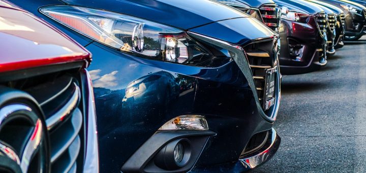row of cars in a dealership